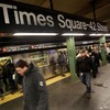 Woman killed after being pushed in front of subway train at Times Square station