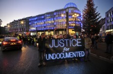 Hundreds of undocumented migrants stage candlelit march to Dáil