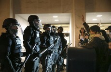 Shooting at anti-Trump protest as demonstrators plan more action