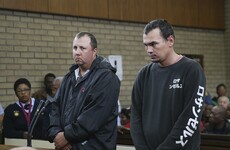 Two men in court for 'shoving black man into coffin and threatening to burn him alive'