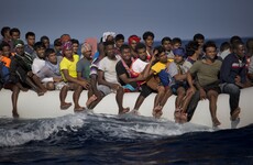 Lawyers for alleged human trafficker say photos of the 'real criminal' exonerate their client