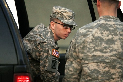 Bradley Manning is escorted from a security vehicle to a courthouse in Fort Meade in Maryland on Monday