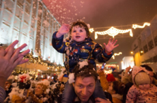 Young boy who survived six-storey fall from hotel balcony turns on Limerick Christmas lights