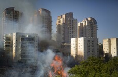 Israel warns of 'arson terror' link to bushfires, as 60,000 flee northern city of Haifa