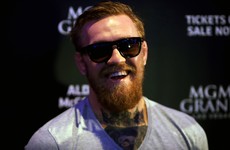 McGregor claims he remains two-weight champion and Mayweather is scared
