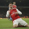 Arsenal dig deep and move to the summit as Mesut Ozil delivers collector's item goal