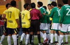 A political low blow: Bolivian president knees rival in groin