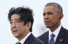Japanese PM offers 'everlasting condolences' but holds back from full apology at Pearl Harbor