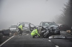 Woman killed and several injured in 20 car pile-up in the UK