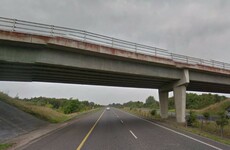 Ambulance taken out of service after being struck by object thrown from motorway flyover