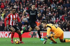 Defoe bags two penalties to force a draw against Liverpool