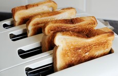 An elderly Australian convict has allegedly murdered a fellow inmate with a toaster