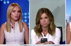 This video of two newsreaders arguing about wearing the same colour is delicously awkward