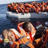 Nearly 100 people missing, eight dead, after latest migrant boat tragedy off Libyan coast
