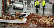 In pictures: storms topple trees and trucks in Britain