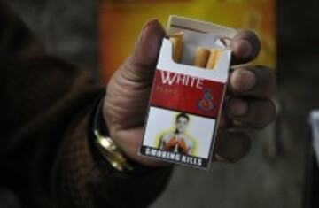 john terry cigarette case Chelsea legend 'disgusted' after Gold Flake use Aston Villa star's photo on packaging John Terry considers legal action