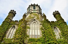 Why has the Irish language been removed as a requirement for NUIG's President?