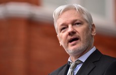 'I stand by everything I said': Assange keeps pledge to travel to the US