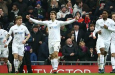 Liverpool's title hopes dealt major blow as struggling Swansea stun Anfield
