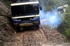 Passengers watch as bus plunges from Bolivia's 'death road'