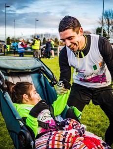 Father vows to run marathon while pushing daughter in wheelchair