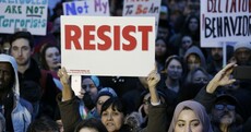 Confusion and outrage over Trump migrant ban as UK secures exemption