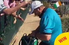 Irish golfer Shane Lowry handed out a bag of cans to fans at a golf tournament