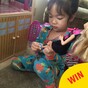 This little girl makes her dolls take their shoes off before entering her Barbie Dreamhouse