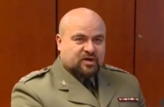 Polish military prosecutor survives after shooting himself at press conference