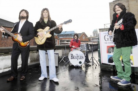 ran King (Paul McCartney), Scott Maher (John Lennon), Binzer Brennan (Ringo Starr) and Rob McKinney (George Harrison) recreate the famous rooftop gig the Beatles did in 1969 on top of the Tivoli Theatre in Dublin to promote the upcoming show 'Get Back - The Story of the Beatles'.