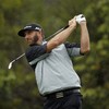 Johnson hits the front at Genesis Open as Lowry withdraws