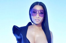 Nicki Minaj casually showed up at a fashion show with her whole boob hanging out