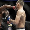 Woodley prevails in Wonderboy rematch to retain UFC title but Dana disagrees with result