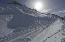 Two tourists dead - and two still missing - after avalanche at French resort