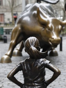 'Fearless girl' stares down the iconic Wall Street bull