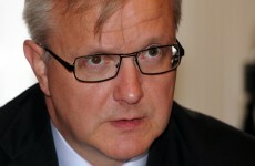 Rehn slams 'inconsistent' credit rating downgrade