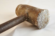 Police investigate after group of men use sledgehammer to break into flat