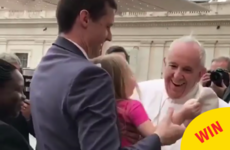 This little girl met the Pope... and slyly nicked his hat