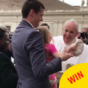 This little girl met the Pope... and slyly nicked his hat