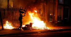 Activist shot dead as protesters storm government building in Paraguay