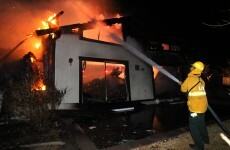 In pictures: Thousands evacuated as fires destroy Nevada homes