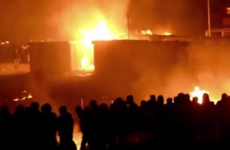Massive arson attack guts French migrant camp