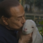 Some people in Italy are very upset about Silvio Berlusconi hugging and kissing this lamb