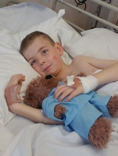 'He’s very brave, he was in surgery for 10 hours': Tommy Long finally gets scoliosis operation