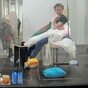 French 'human hen' artist hatches first chick after three weeks of sitting on 10 eggs