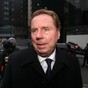 Tottenham Hotspur boss Harry Redknapp arrives at court to face tax evasion charges