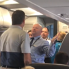 'Hit me. Bring it on': American Airlines worker suspended after squaring up to passenger