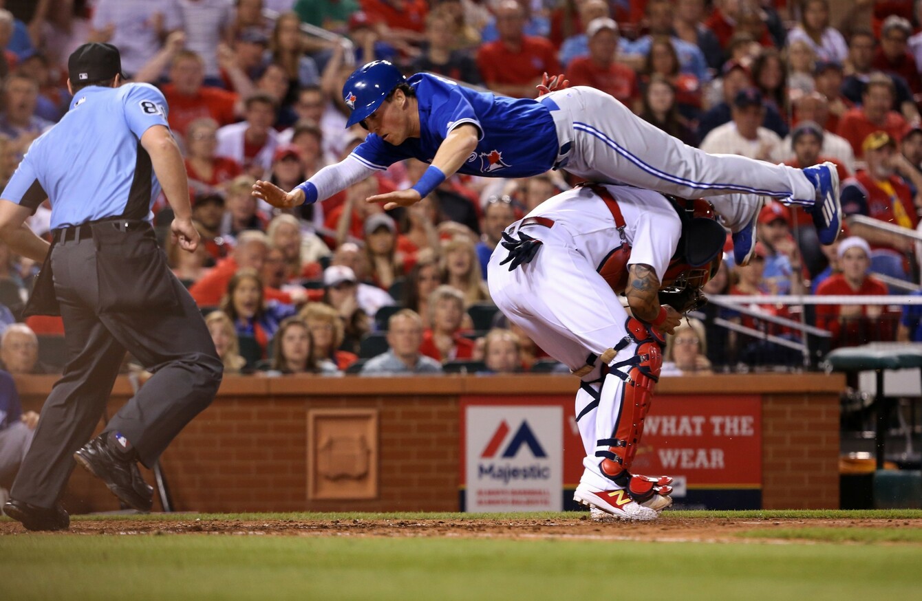 One Of The Toronto Blue Jays Made An Amazing Flip Over Another Player