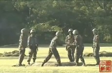 WATCH: Chinese soldiers pass around a live grenade