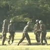 WATCH: Chinese soldiers pass around a live grenade